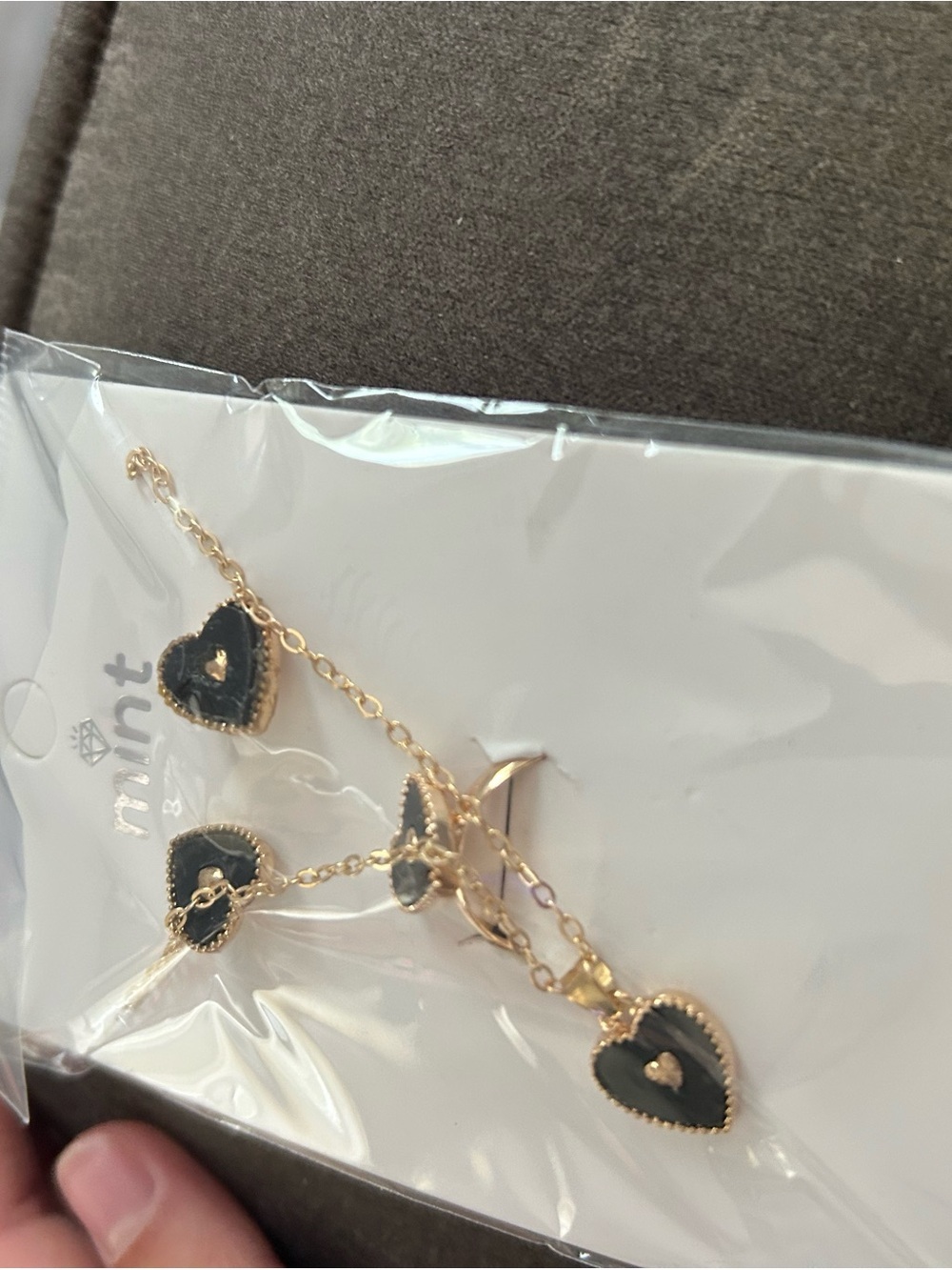 4/$50 mint Black and Gold Heart Pendant Necklace and Earring Set